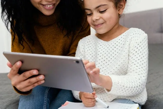 A teacher using a tablet to give immediate feedback to a student working on a holographic display, illustrating modern digital reinforcement in a classroom. The scene is futuristic but grounded in current educational tech trends.