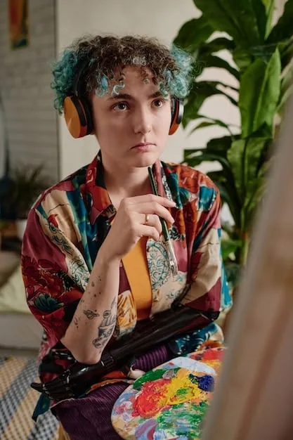 A Gen Z artist proudly displaying their personalized, hand-painted denim jacket, surrounded by various art supplies and references to niche internet subcultures, showing unique fashion expression.