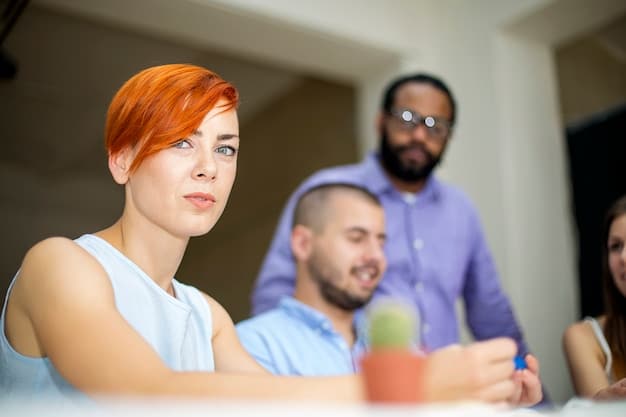 An image of a training session with employees discussing diversity and inclusion in the workplace. The atmosphere is collaborative and open.