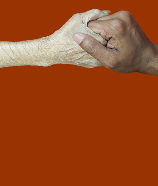 A split image showing two hands of different ages (one younger, one older) clasped together, symbolizing collaboration and unity between generations.
