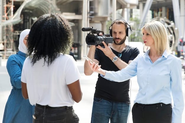 A behind-the-scenes shot of an independent film set, showing a diverse crew working collaboratively. Focus on the creative energy and the hands-on, DIY nature of indie filmmaking, with the director giving instructions and actors rehearsing.