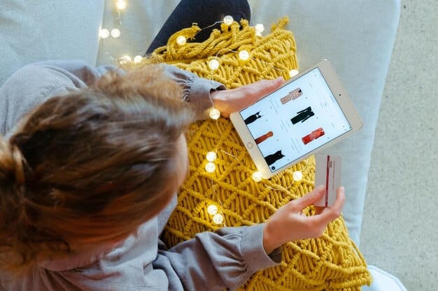 A person is using the IKEA Place app on their tablet to see how a new couch would fit and look in their living room, using augmented reality to overlay the digital image of the couch onto the real-world space.