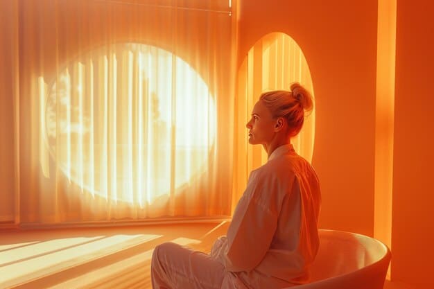 A brightly lit room where a person is sitting near a light therapy box, with a serene expression on their face, bathed in the artificial sunlight.