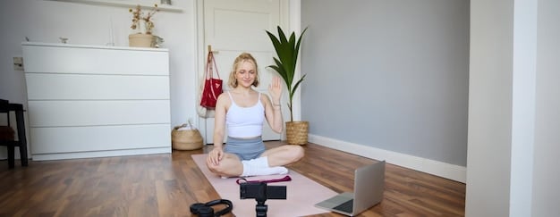 A person practicing yoga in a bright, sunny room. The pose is a calming and centering one, like child's pose or tree pose. The focus should be on the person's calm expression and the peaceful environment.
