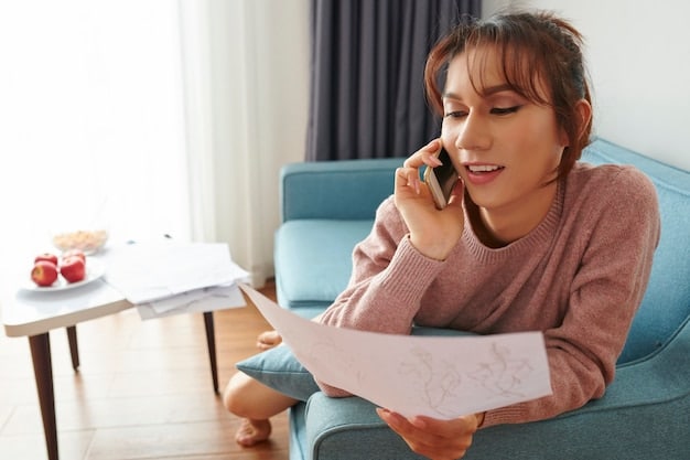 A person making notes on a notebook while talking on their phone scheduling an appointment with a new therapist. The notepad has various options and questions prepared for the first session.