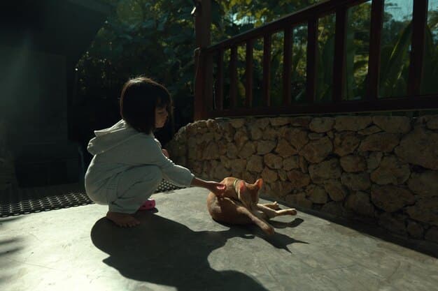 A child sitting alone on a playground, looking withdrawn, while other children play in the background, illustrating social isolation.