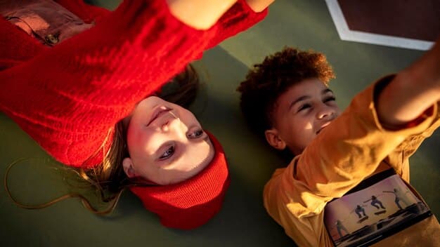 A diverse group of young children, holding hands and swaying gently to music, with happy and engaged expressions on their faces, in a brightly lit learning environment.