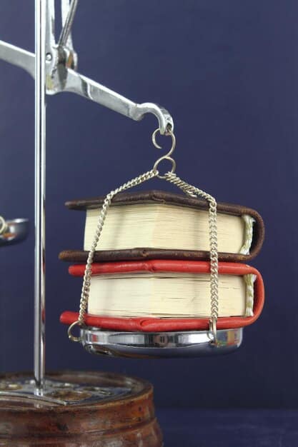 A conceptual image showing a legal gavel striking down on a stack of academic books, representing the judicial impact on educational policies. The image should be serious and convey a sense of change and decision.