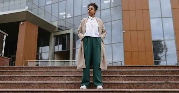 A Gen Z individual showcasing a gender-neutral oversized blazer and wide-leg trousers, accessorized with bold, unique jewelry made from recycled materials, reflecting sustainable and expressive fashion.