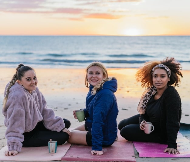 A Gen Z individual practicing yoga on a beach at sunrise, illustrating a focus on mental wellness and personal growth during travel.
