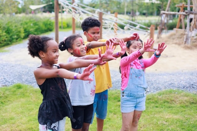 Children of various ethnic backgrounds playing cooperatively on a playground, showing diverse social interaction and joy.