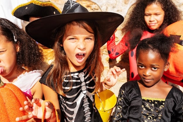 A diverse group of children engaging in dramatic play, dressed in various costumes, laughing and interacting in a playful setting that promotes social and language development.