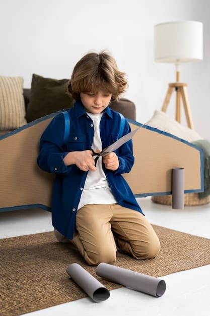 A child independently zipping up their jacket and putting on their shoes, demonstrating fine motor skills and self-care readiness.