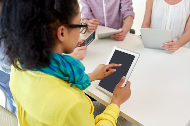A Gen Z student using a tablet to collaborate on a school project with peers, showing engagement and digital literacy in an educational setting.