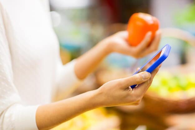 A close-up of a SNAP (Supplemental Nutrition Assistance Program) EBT card being swiped at a grocery store checkout, with fresh produce in the background, symbolizing access to healthy food.